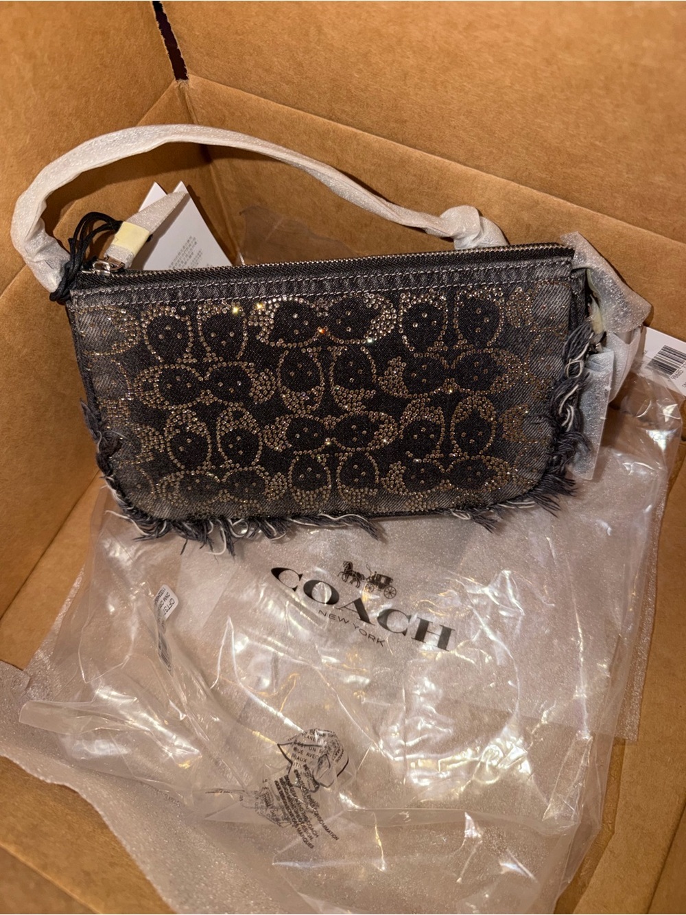 Nwt coach denim distressed crystal plaza